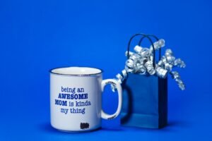 a mug and a small paper bag